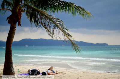 Enjoying Boracay Beach Under A Coconut Tree