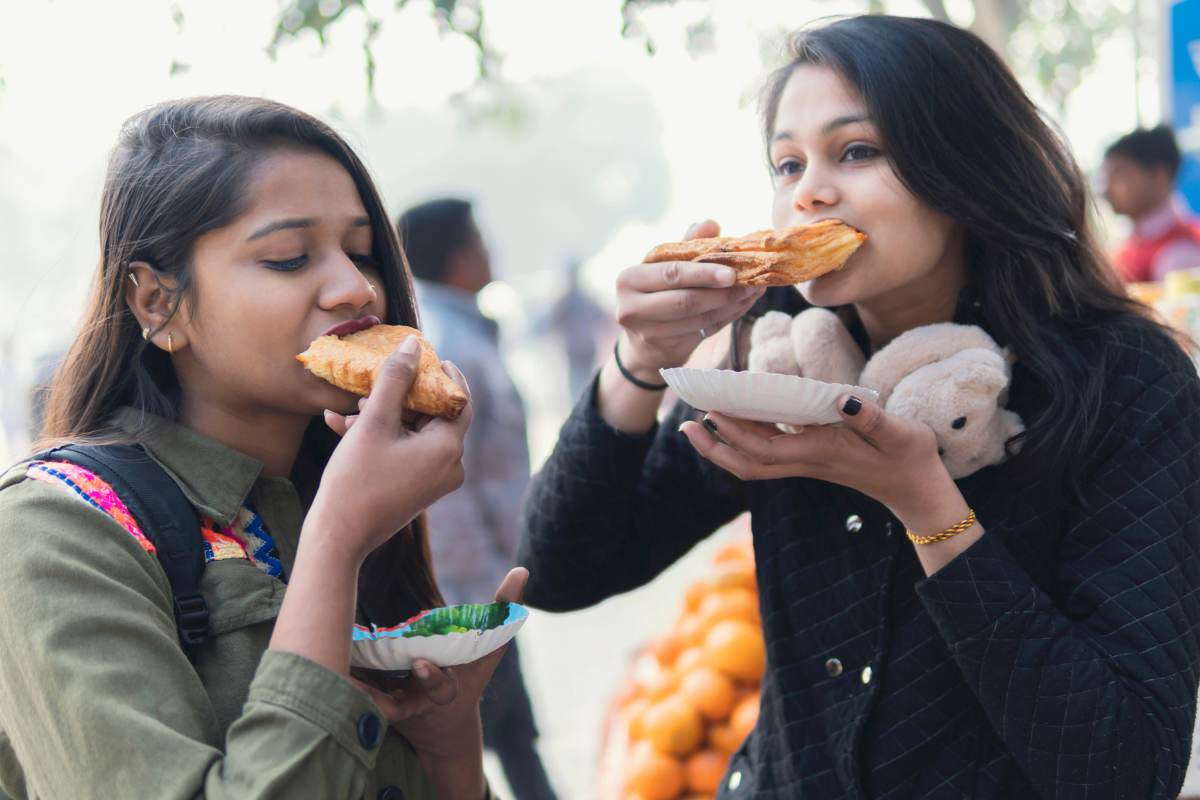 Girls eating fast food from D'Mall Boracay Island